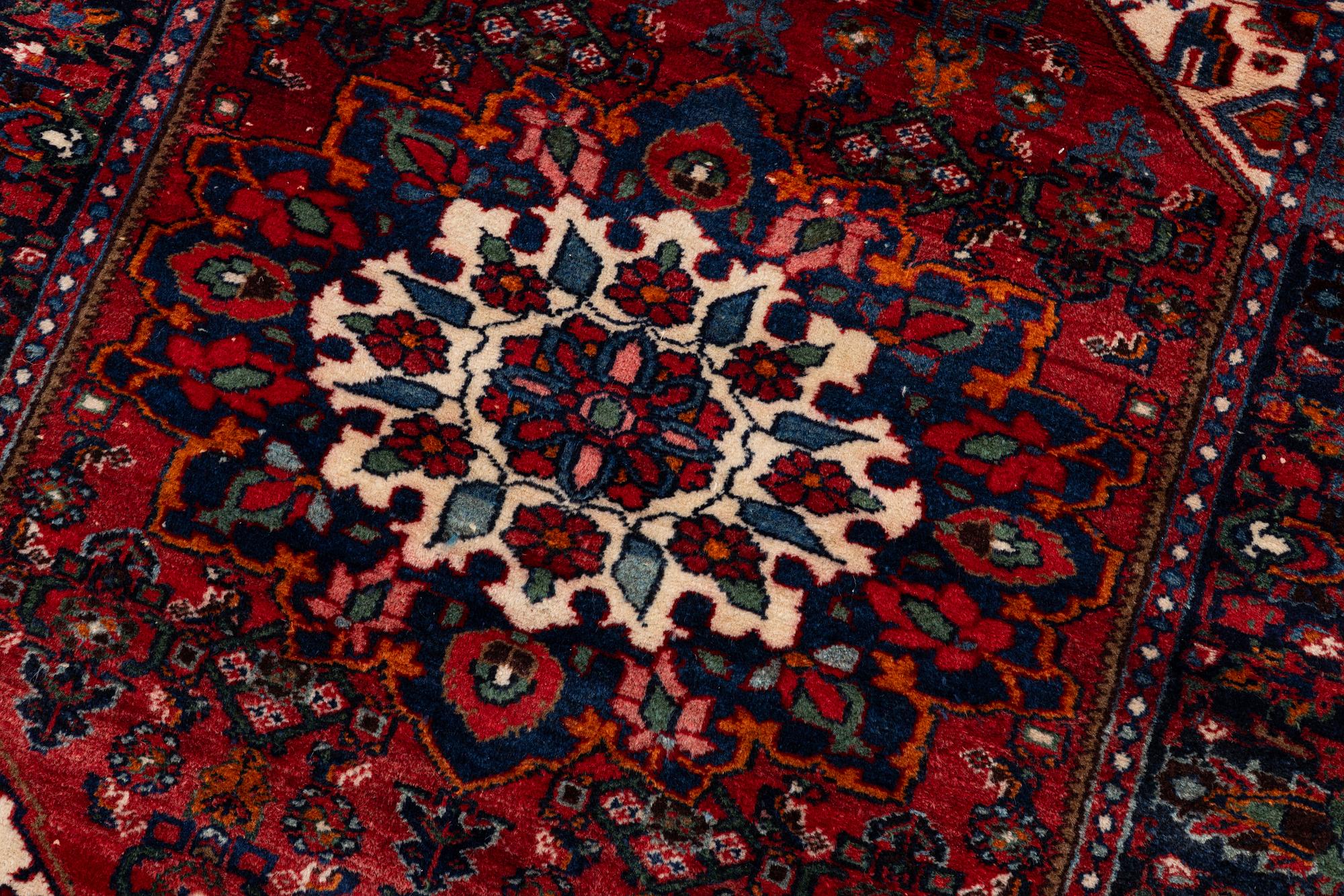 An Old Northwest Persian rug, c. 127 x 125 cm.