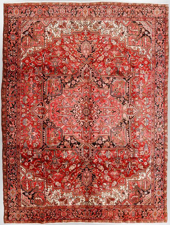 A Heriz rug, 323 x 264 cm.