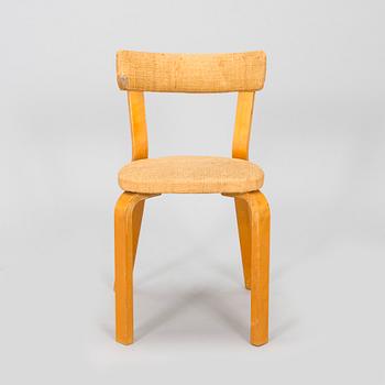 Alvar Aalto, mid-20th century '810' cabinet and a 
'69'chair Oy Huonekalu- ja Rakennustyötehdas Ab.