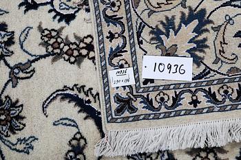 A carpet Nain, part silk, ca 290 x 196 cm.