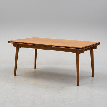 Hans J Wegner, a model 'AT-312' teak veneered dining table, Andreas Tuck, Denmark.