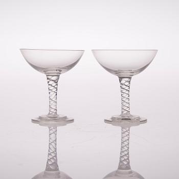A set of twelve liqueur glasses from the first half of the 20th century.