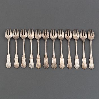A set of twelve French silver oister-forks, after 1838.