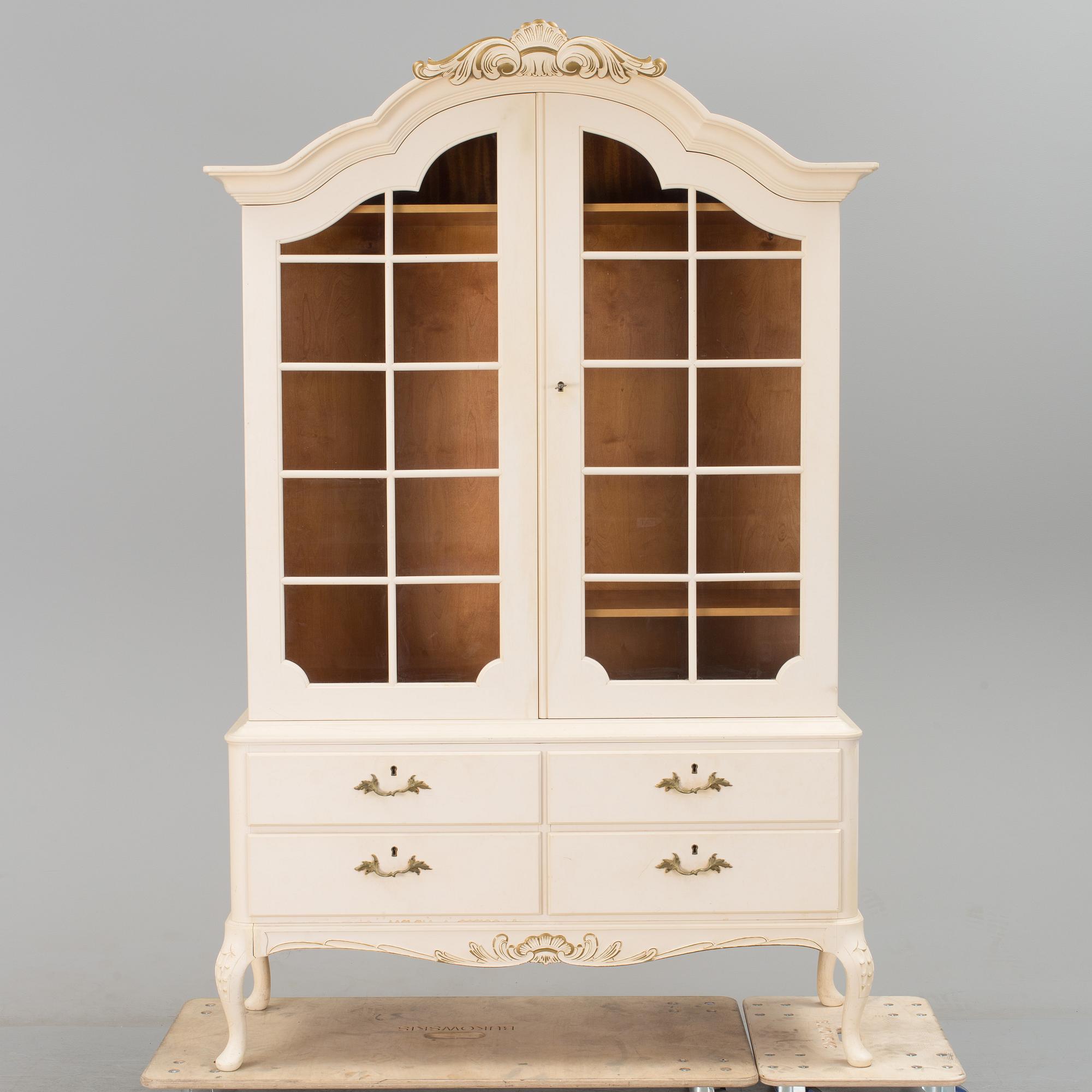 A mid 1900s cabinet by Oscar Edv Ekelunds Snickerifabriks AB, Virserum.