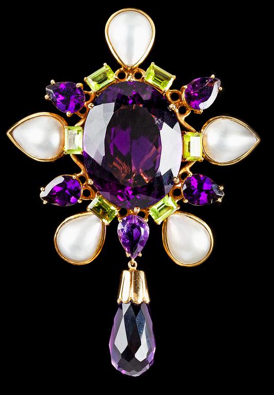 A large amethyst, peridote and mabe pearl pendant.