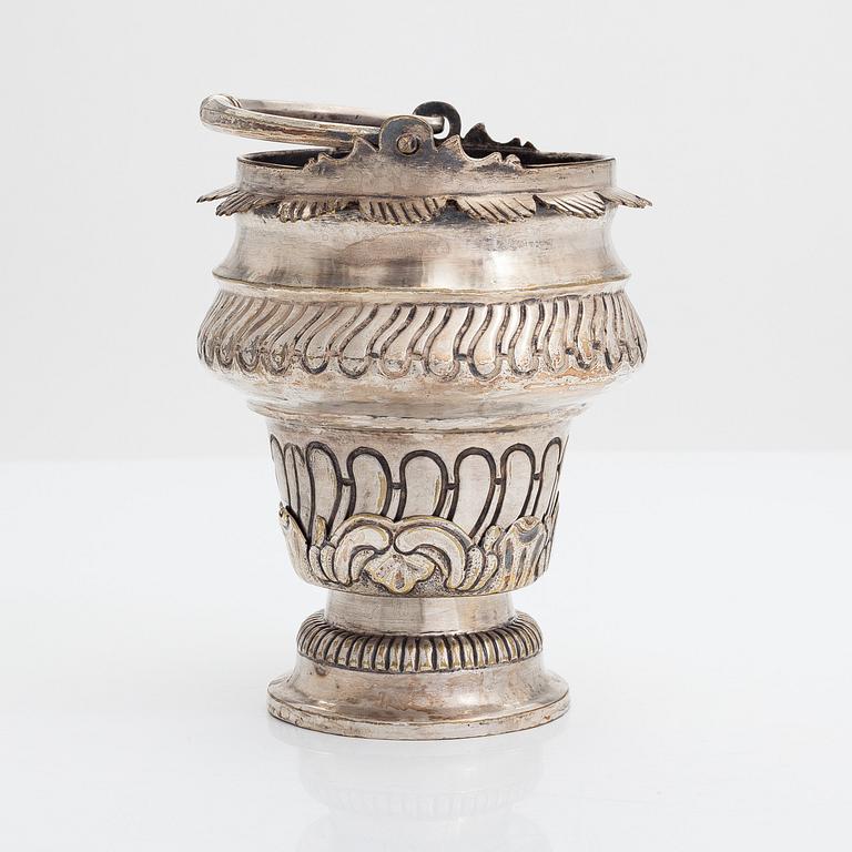 A silver plated brass Holy water bowl stamped L.G and dated 1774.