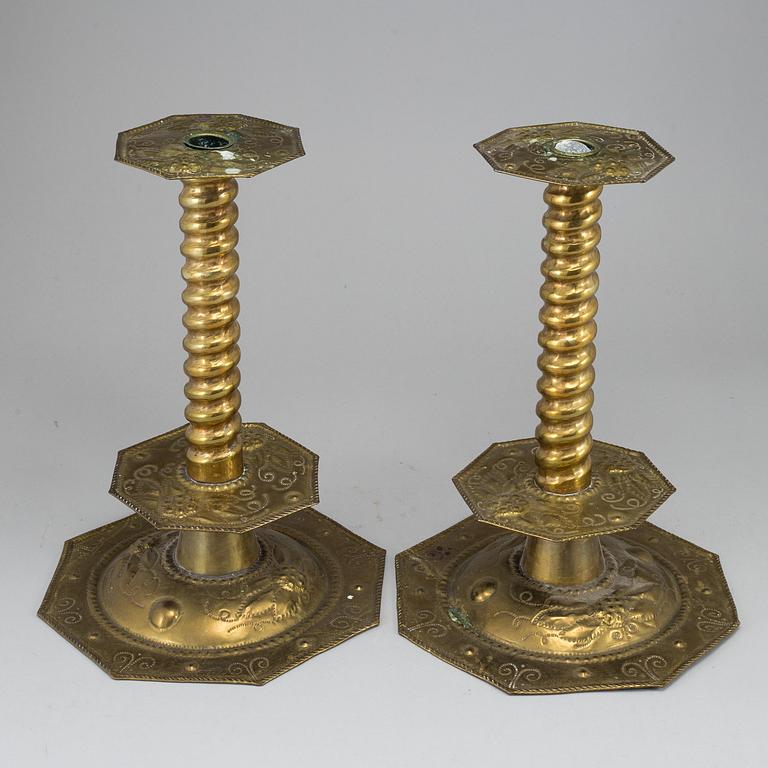 A pair of baroque style candle holders.