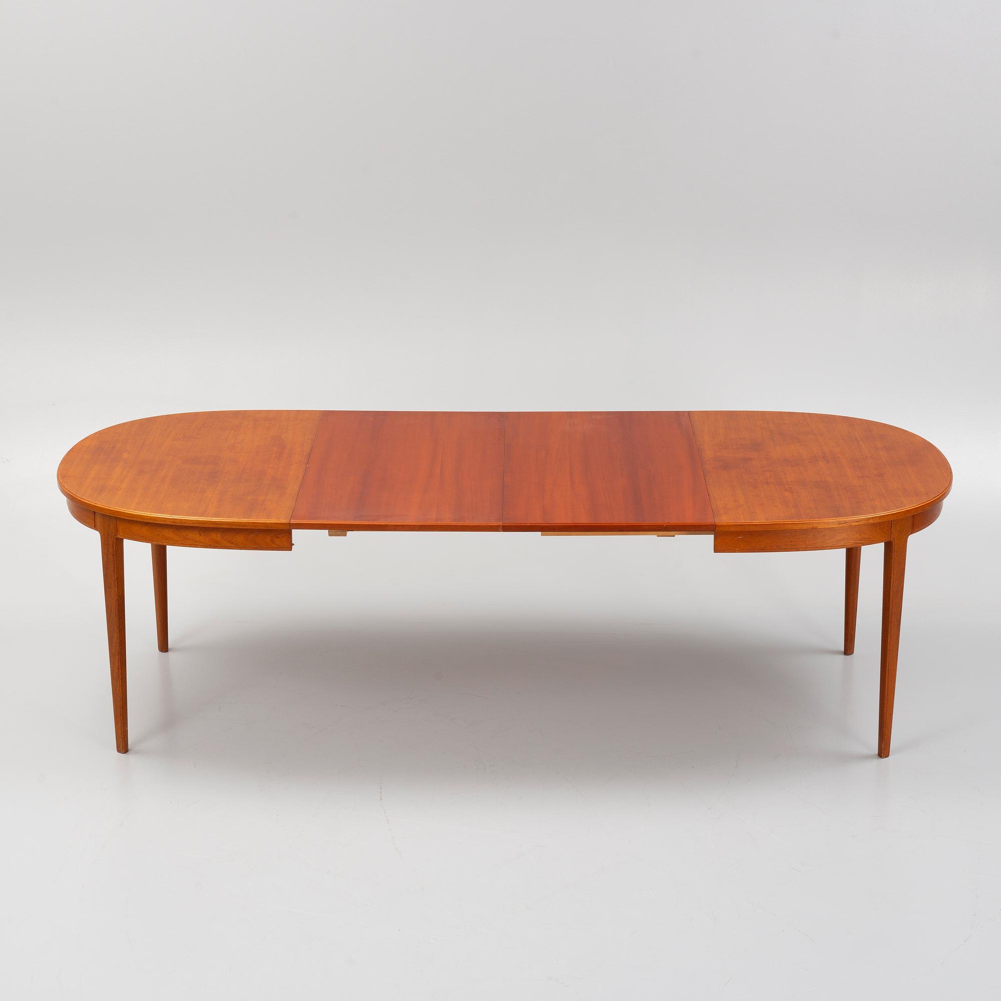 Carl Malmsten, a 'Herrgården' dining table and six chairs, Bodafors, second half of the 20th Century.