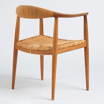 Hans J. Wegner, an oak and rattan 'The Chair', JH501, Johannes Hansen, Denmark.