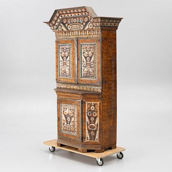 A Swedish Dalecarlian folk art cabinet dated 1808.