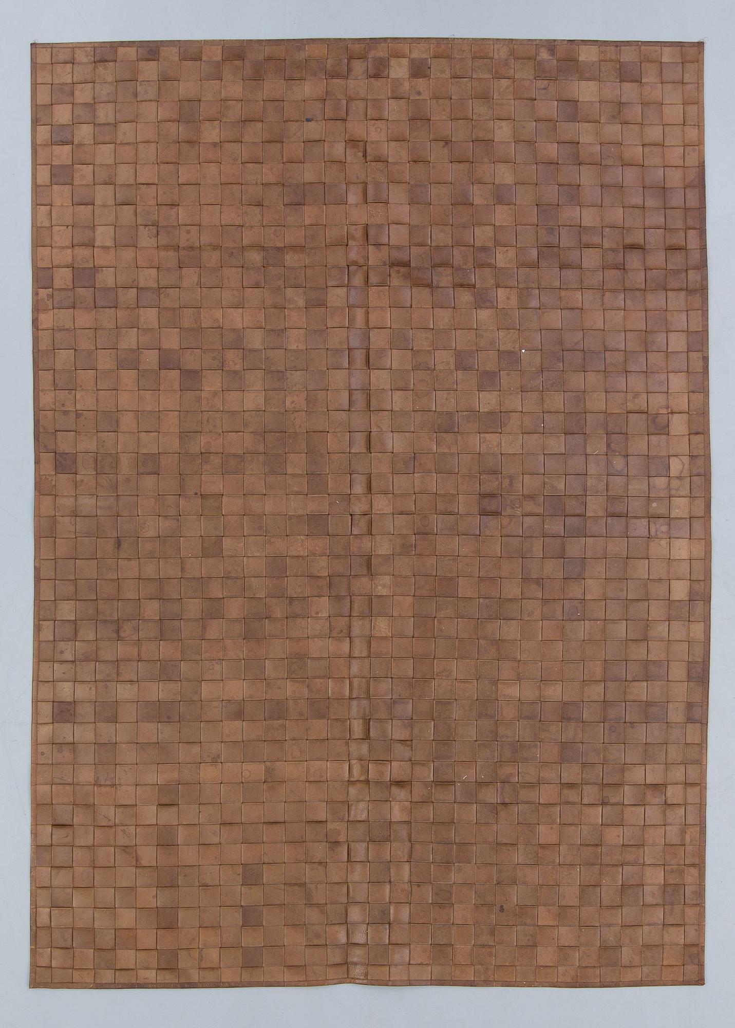 CARPET, leather, late 20th century. 240 x 169 cm.