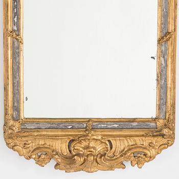 A mid 18th century rococo mirror.