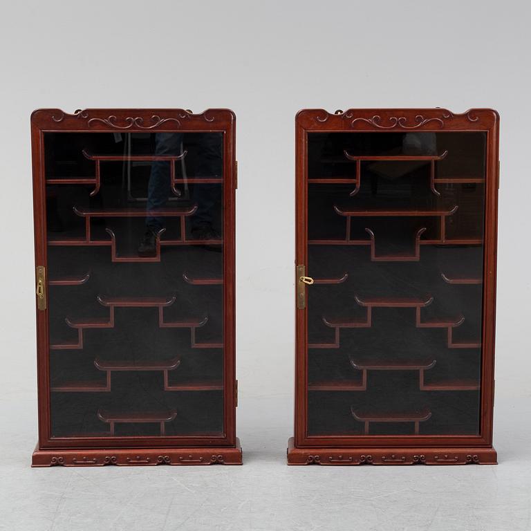 A pair of chinese wall cabinets, 20th century.