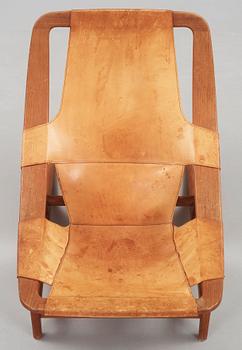 An Arne Tidemand Ruud 'Holmenkollen' teak and leather lounge chair, Norcraft, Norway 1950's-60's.