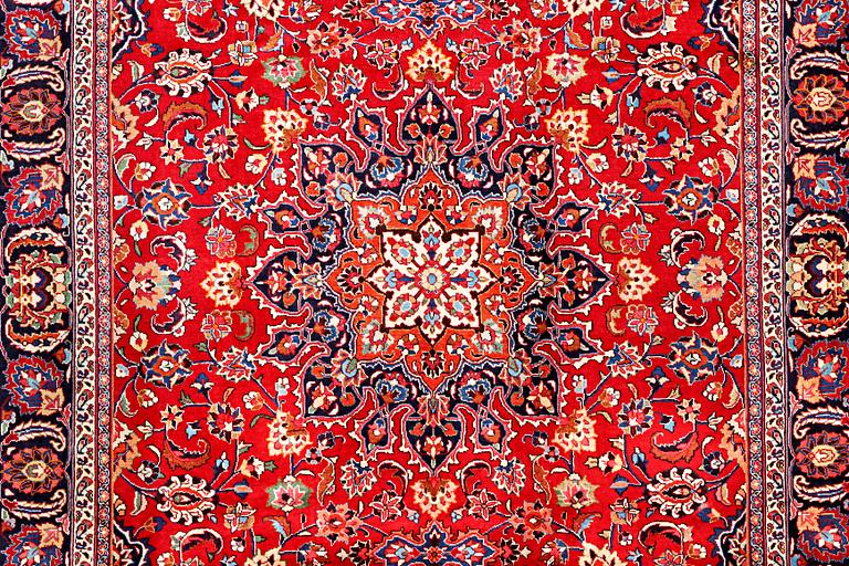 A Meshed carpet, c. 352 x 250 cm.