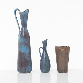 Carl-Harry Stålhane and Gunnar Nylund, two stoneware pitchers jugs and a vase, Rörstrand.