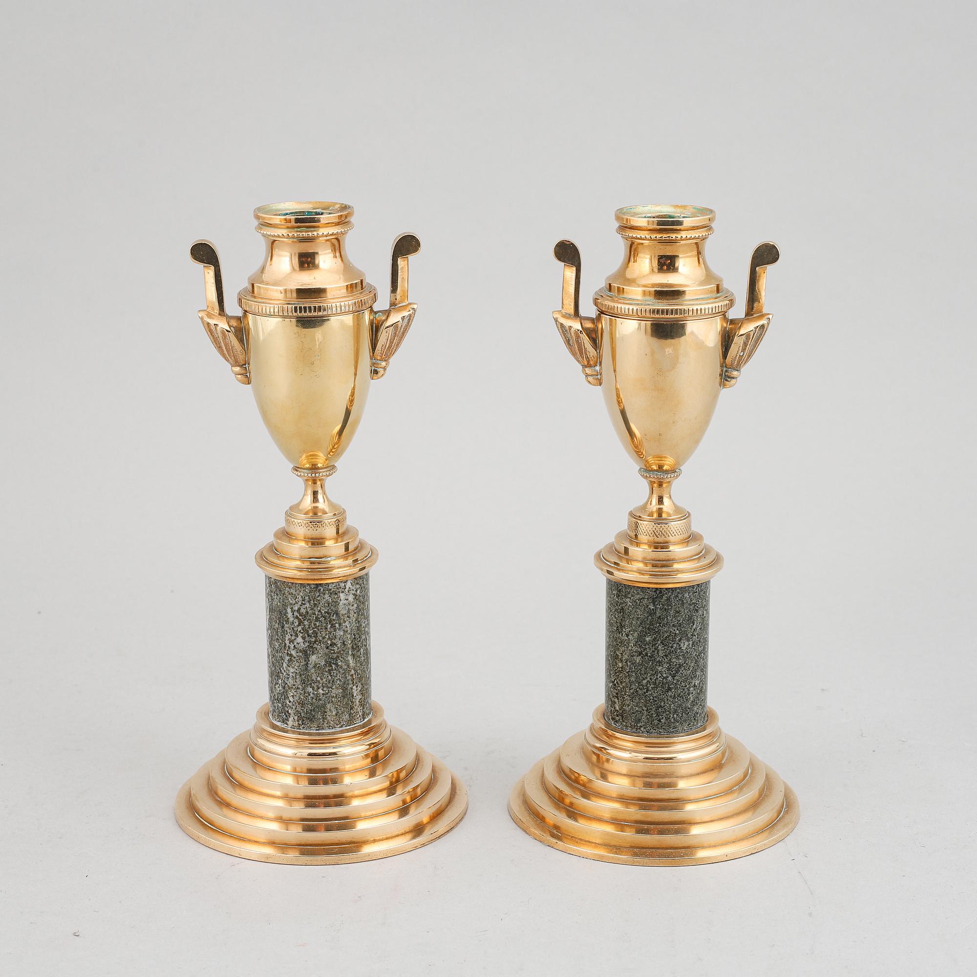 A pair of brass and marble candle holders/casslettes from Skultuna, 20th century.