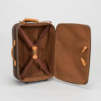 Louis Vuitton, a Monogram Canvas "Pegase 55" suitcase.