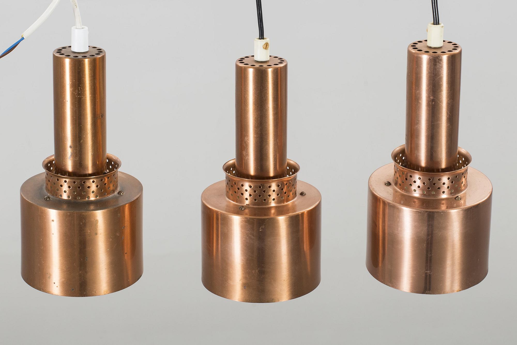 HANS-AGNE JAKOBSSON, three copper pendant lights from Markaryd.