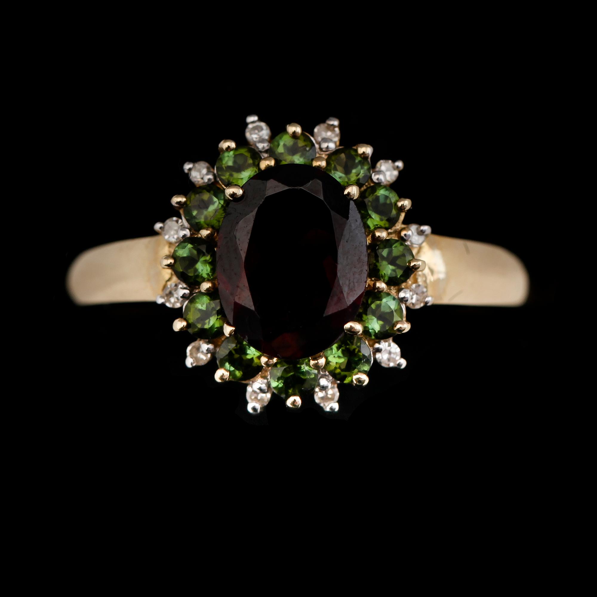 RING, 10K guld, diamanter tot ca 0.06 ct, granater och turmaliner.