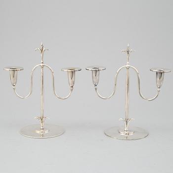 a pair of Elis Bergh silver plated candelabras, Swedish grace, CG Hallberg, Stockholm, 1920s.