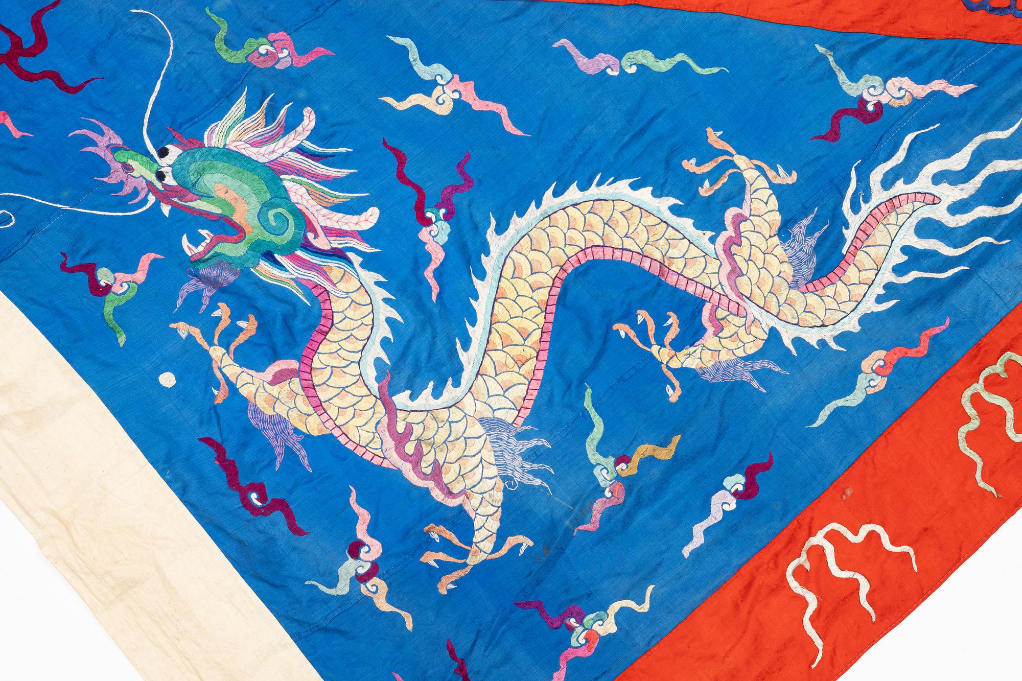 A Chinese embroidered triangular silk banner, late Qing dynasty/possibly early 20th century.