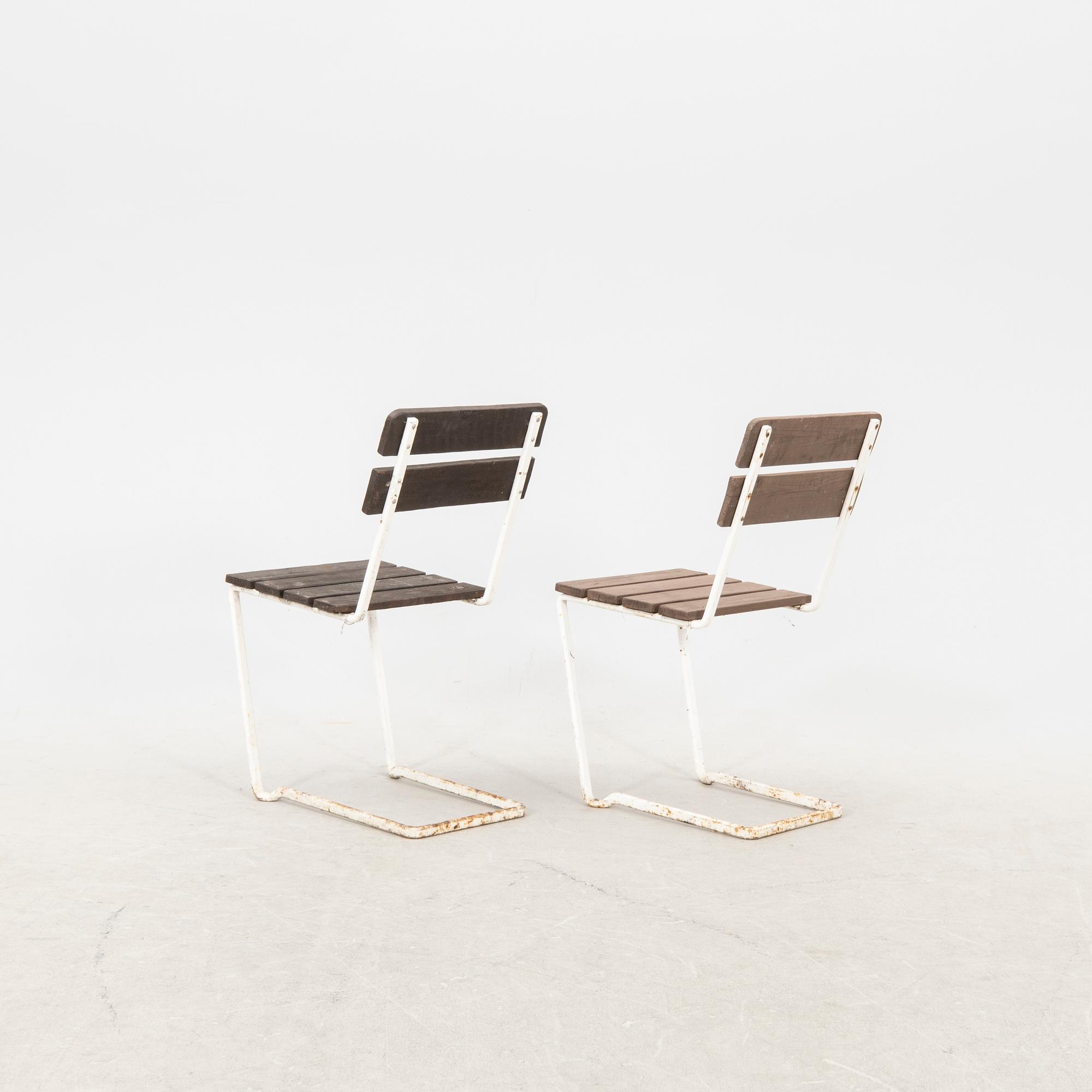 A pair of armchairs and a pair of chairs Grythyttan mid 1900s.