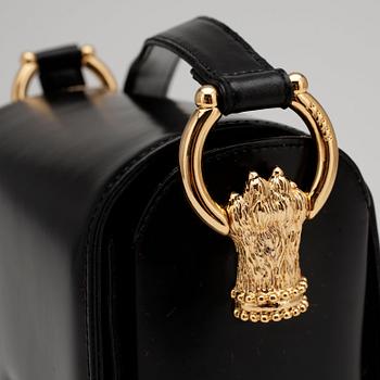 GIANFRANCO FERRÉ, a black leather shoulder bag.
