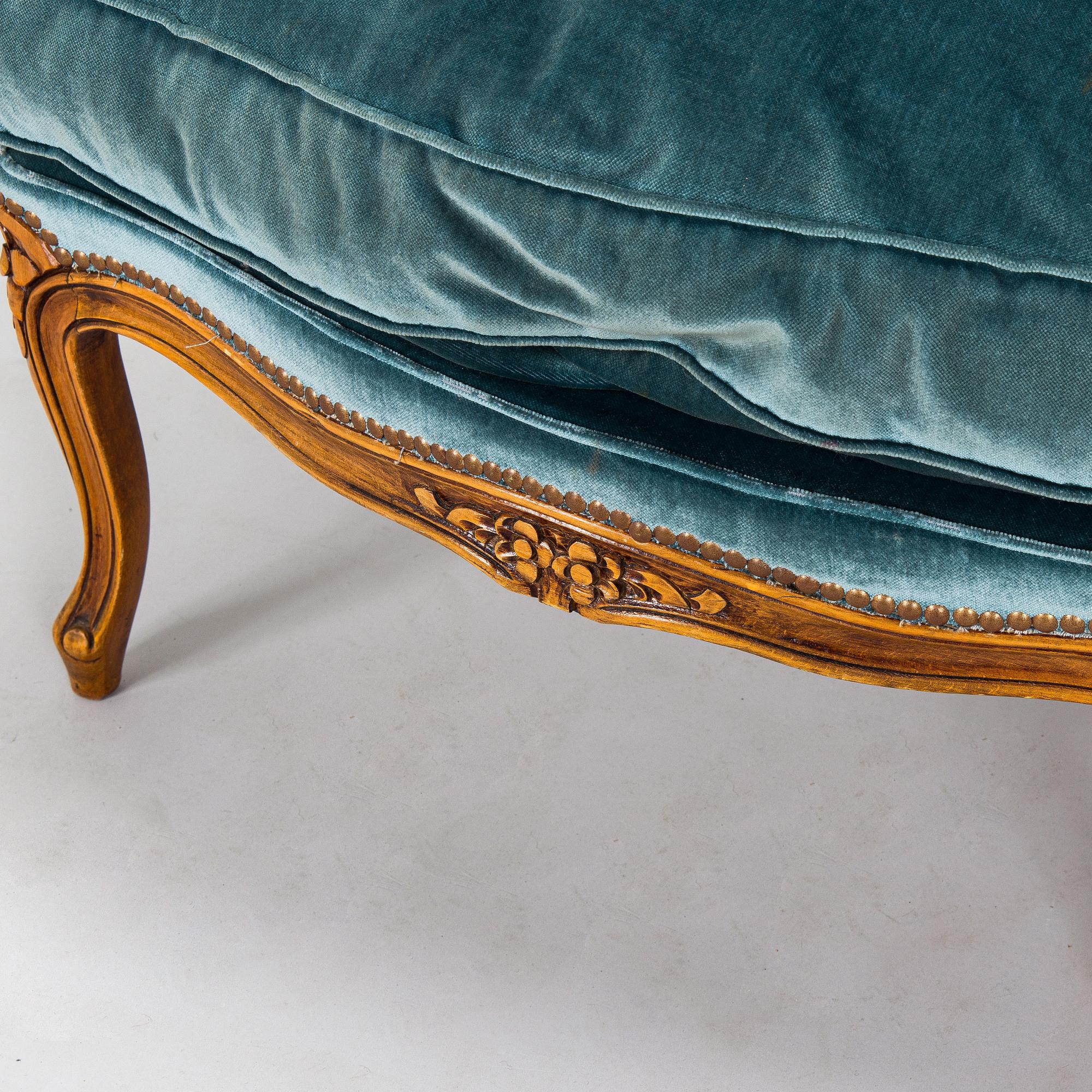 A pair of Louis XV style armchairs, mid-20th century.
