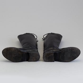 a pair of Ann Demeulemeester, "Vitello Lucido Nero Riding Boots". Size 38.