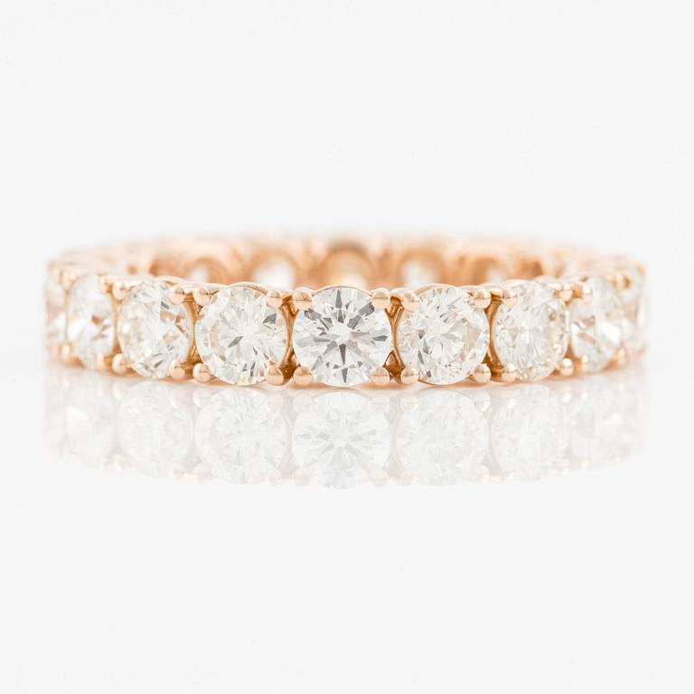Eternity ring with brilliant-cut diamonds.