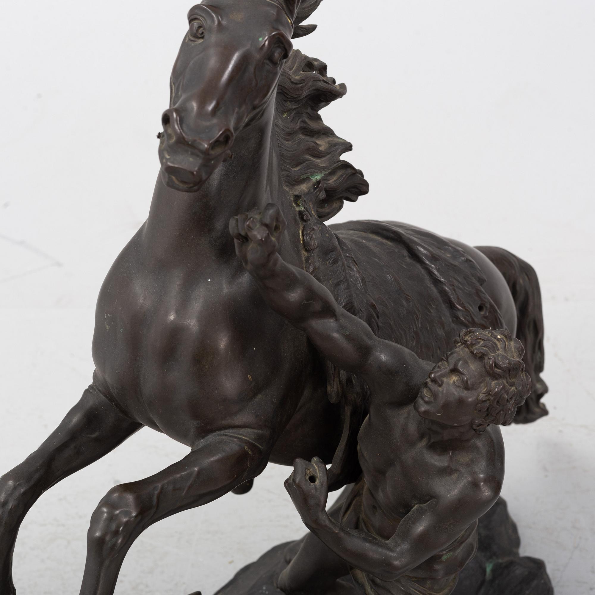 Guilliaume Coustou, after, a pair of bronze sculptures.