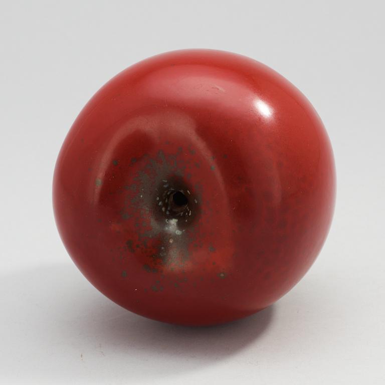 A Hans Hedberg faience apple, Biot, France.