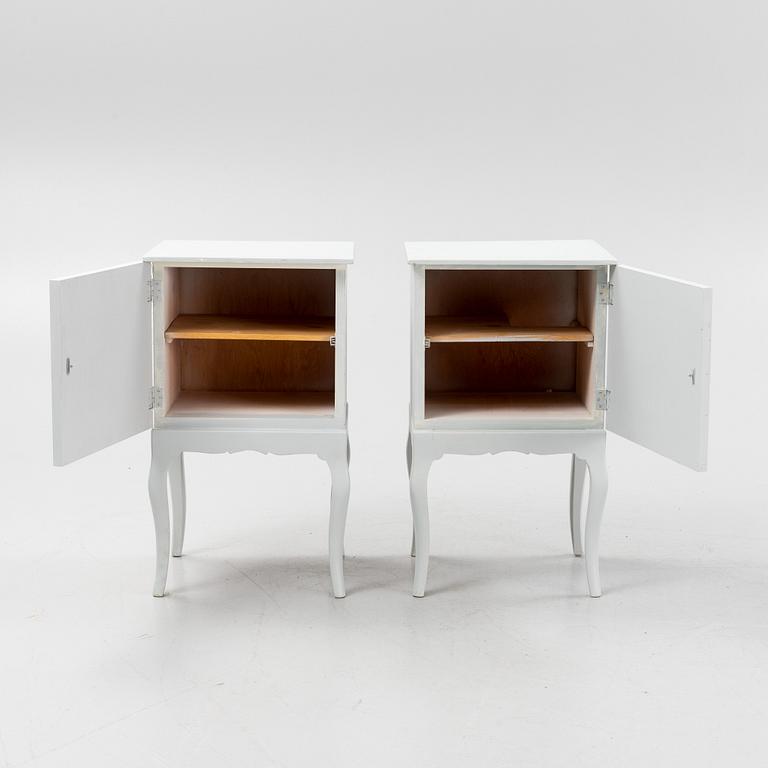 A pair of painted bedside tables, first part of the 20th century.