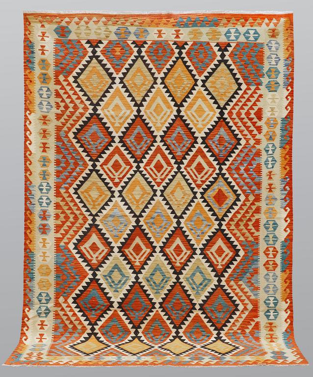 A carpet, kilim, ca 304 x 210 cm.