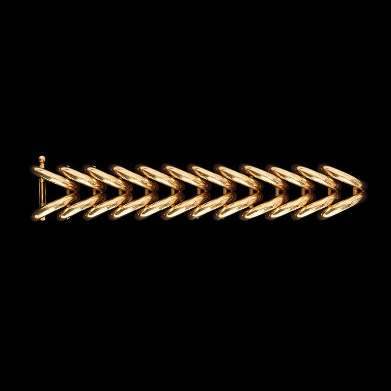 A gold bracelet.