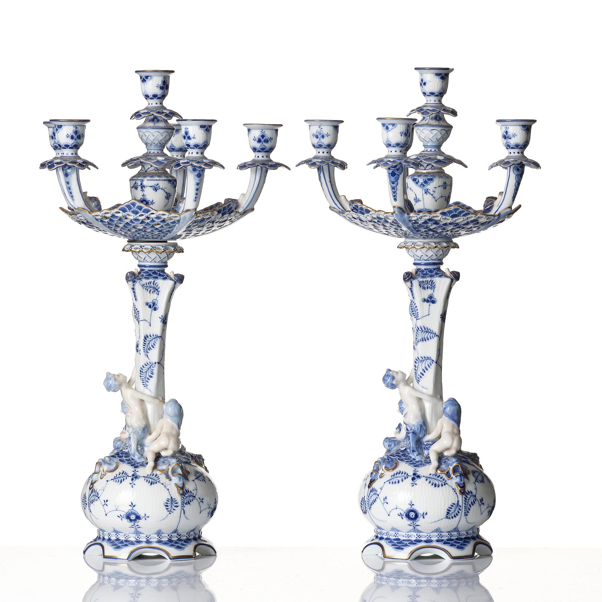 A pair of Royal Copenhagen 'Musselmalet' / 'blue fluted full lace' six-light candelabras, Denmark, 1898-1923.