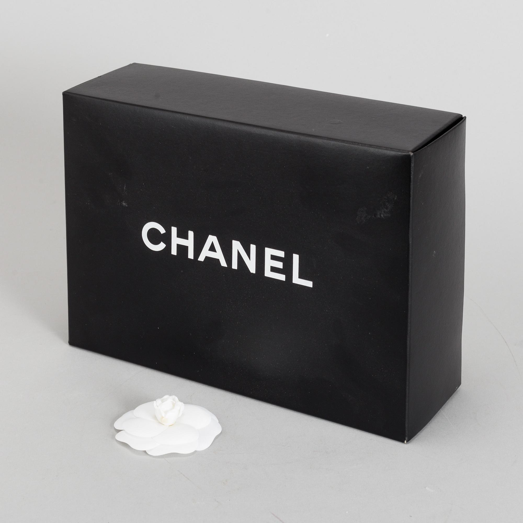 CHANEL, a black quilted fabric 'Flap Bag', 2015-2016.