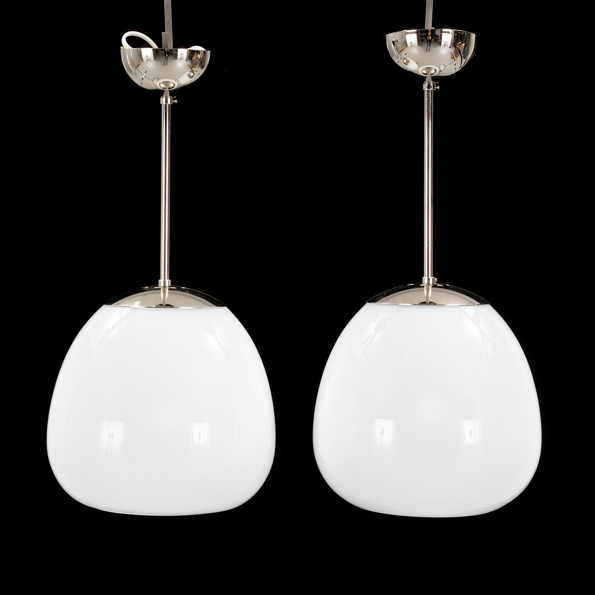 A pair of ceilings from Pukeberg, 1940s. Height ca 46 cm.