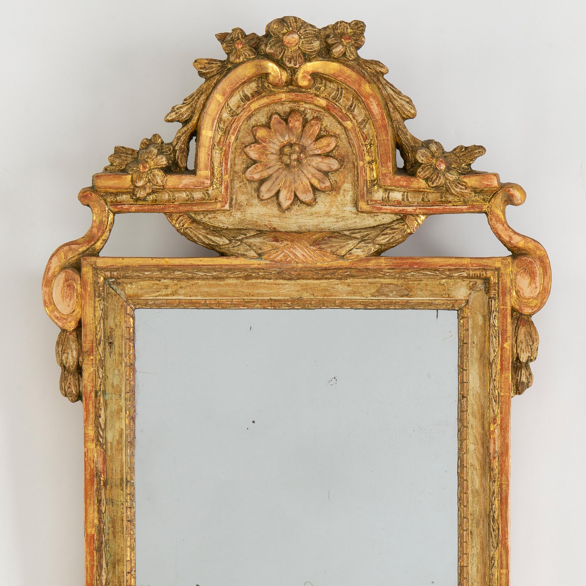 A Gustavian mirror by Carl Gustaf Fyrwald, active in Stockholm 1750-1825.