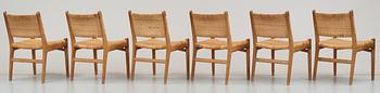 A set of six Hans J Wegner oak chairs by Carl Hansen & Son, Denmark.