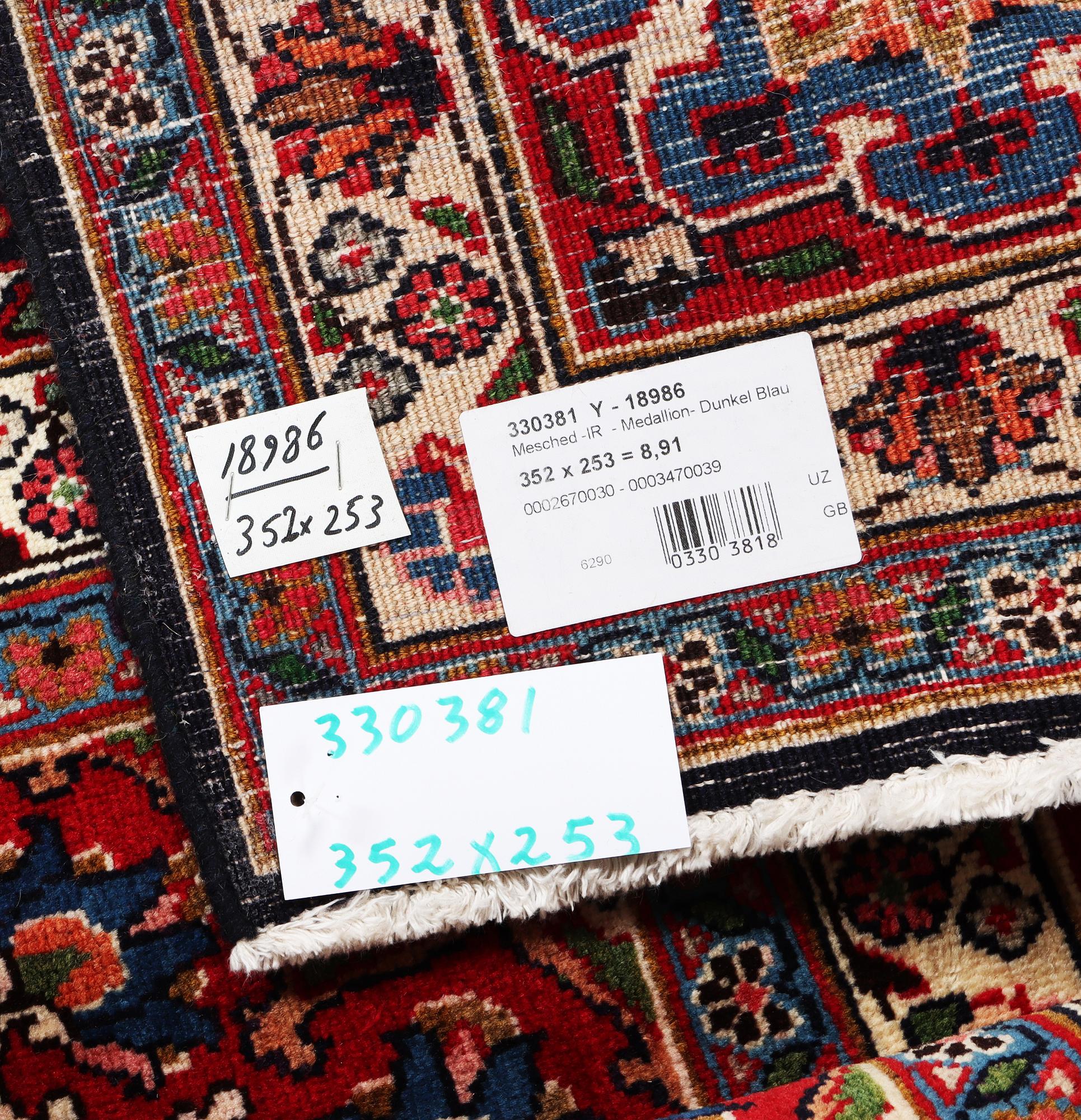 A Meshed carpet, c. 352 x 253 cm.