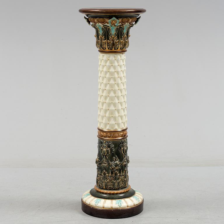 An end of the 19th century maiolica pedestal by Rörstrand.