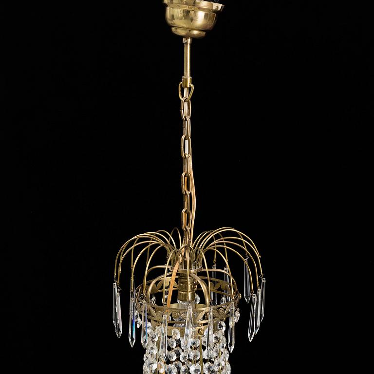 A five light candelabra and two wall scones, Gustavian style, 20th Century.