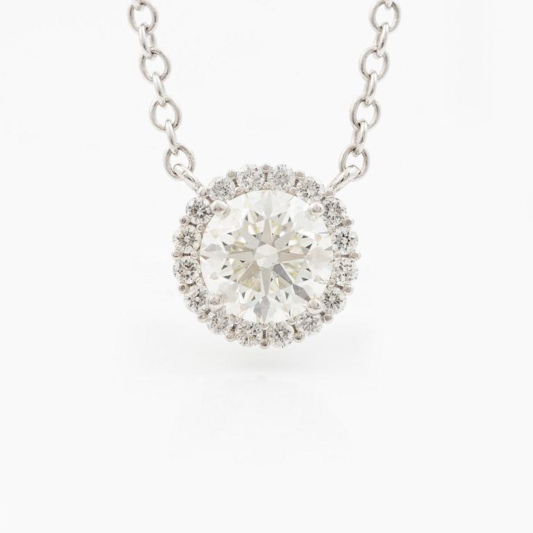 Collier 18K vitguld med briljantslipad diamant.