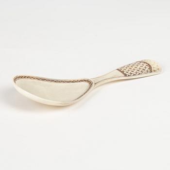 A horn spoon by Folke Fjällström, signed and dated -78.