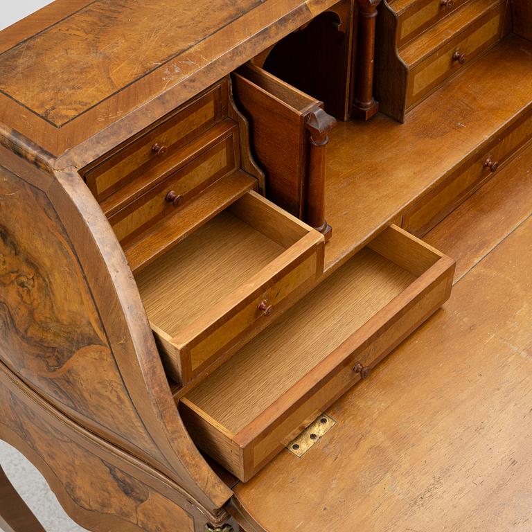 A Rococo-style secretaire, first half of the 20th century.