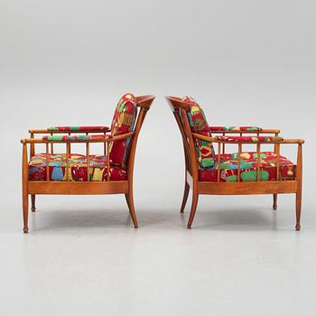 Kerstin Hörlin-Holmquist, a pair of 'skrindan' armchairs, OPE-Möbler, second half of the 20th century.