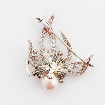 A WA Bolin brooch in platinum set with a pearl and round brilliant- and eight-cut diamonds.