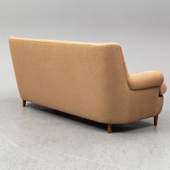 A 'Hemmakväll' sofa by Carl Malmsten.